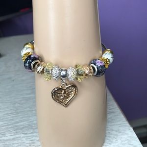 Beautiful multi tone heart bracelet handmade